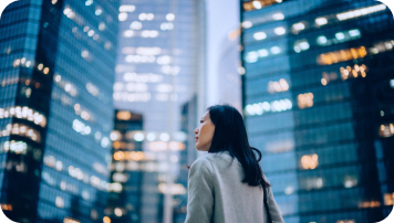 A person navigating through city buildings. achive
